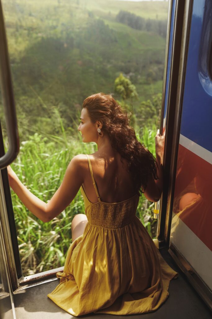 Travel and Exploration of Tourist Woman by Train to Famous Landmarks in Sri Lanka.